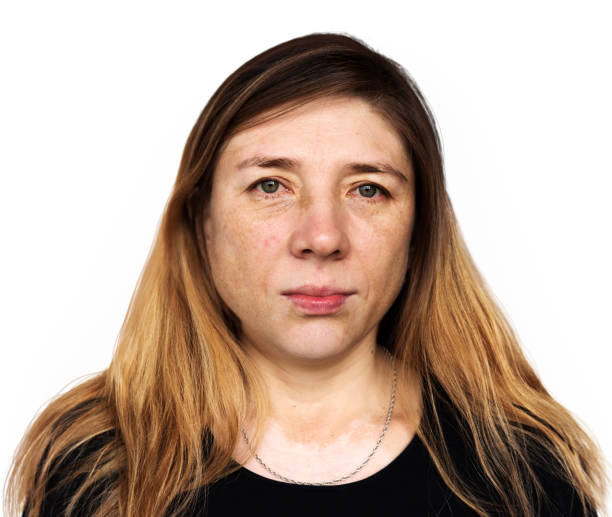 istock Portrait woman staring face on white background 886547864