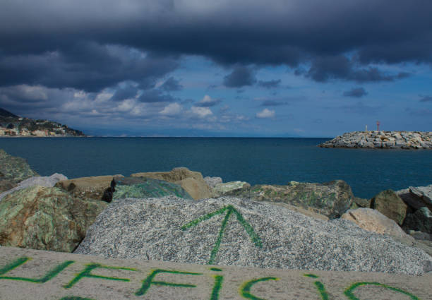 an unusual office located on rocks at the sea