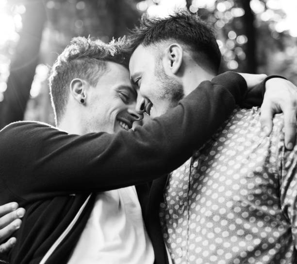 istock Gay Couple Love Outdoors Concept 886550360