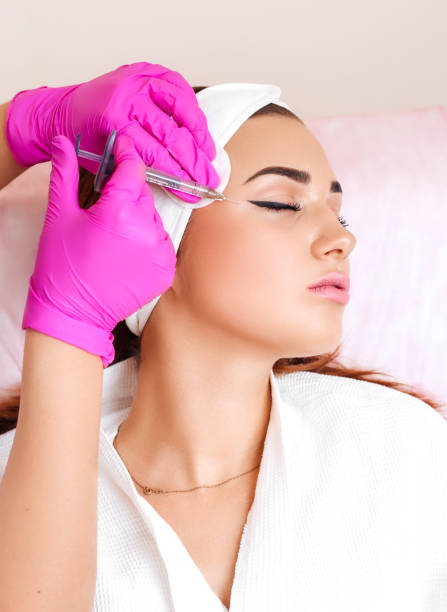 istock Mesotherapy injections in the face. 886550962