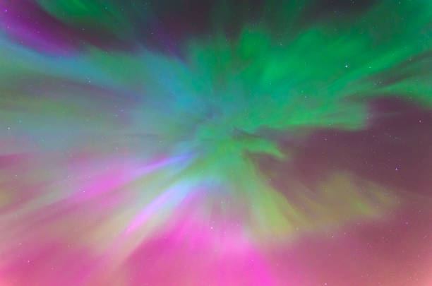 istock Polar lights Aurora Borealis in the night starry sky, texture and multi-colored natural phenomena. 886558146