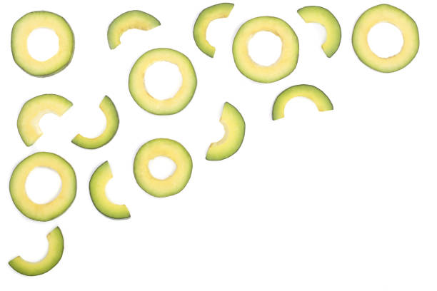 istock slices of avocado isolated on white background with copy space for your text. Top view 886561190