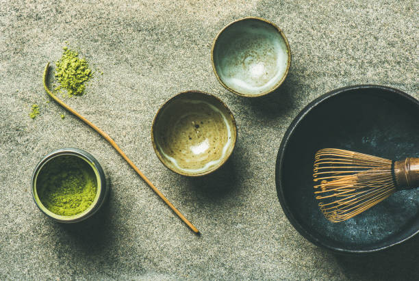istock Japanese tools for brewing matcha tea, grey background, top view 886564796