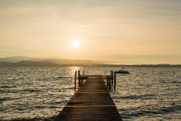 istock Golden sunrise on Garda lake 886574432