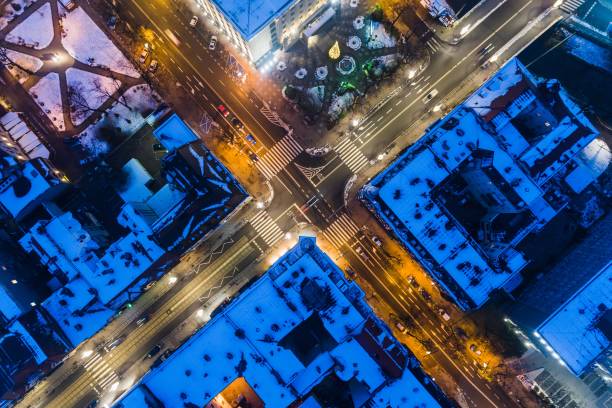 istock Aerial drone view on city intersection during winter night 886575556