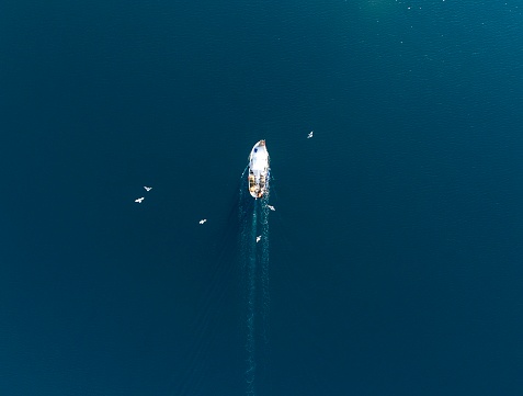 Drone Photography of A Fishing Boat in the Mediterranean Sea.