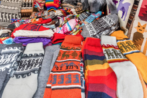 istock Peruvian traditional wares for sale in Pisac, Peru 886592900