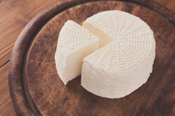 istock Cheese wheel, homemade indian paneer 886595444
