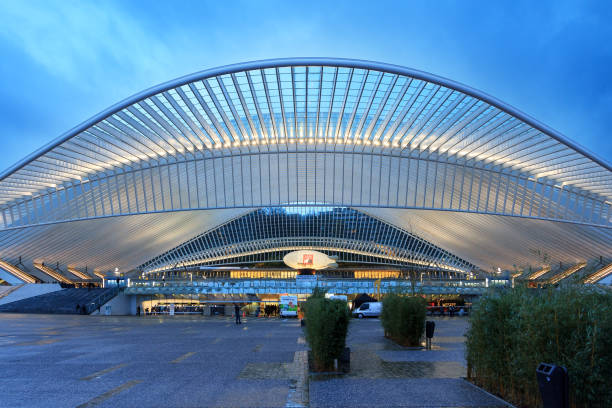 Beautiful view of the modern architecture railway station Liege-Guillemins with steel shapes and lines in the blue hour in Belgium