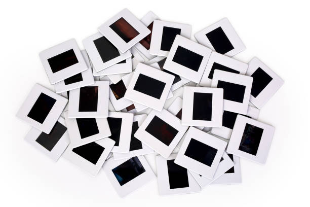 istock Vintage 35-mm mounted film slides on white background 886600678