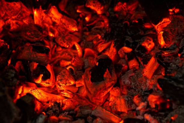 istock black red heat from coals of fire 886620162