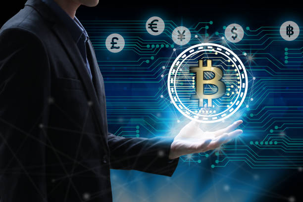 istock Businessman hand holding global network using Currencies sign symbol interface of Bitcoin Fintech, virtual currency blockchain technology concept, Investment Financial Technology Concept 886624742