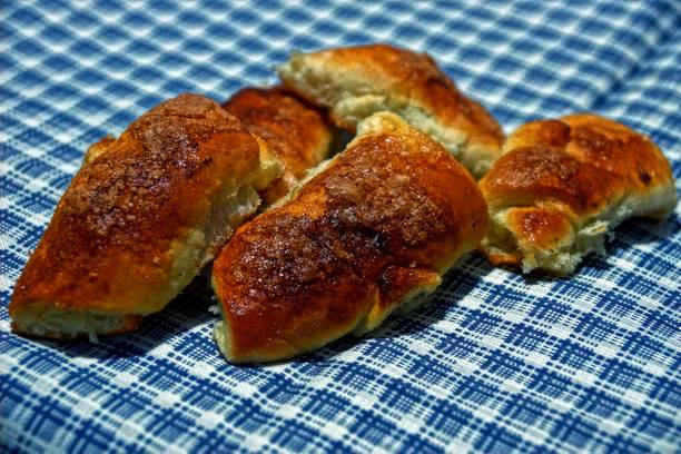 istock fried sweet pies in a pile on the checkered fabric 886629656
