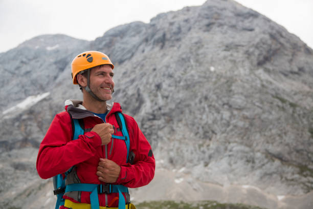 istock Mid adult man hiker looking away and smiling 886636664