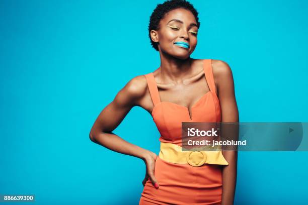 Beauty Shot Of Woman With Vibrant Makeup Stock Photo - Download Image Now - One Woman Only, Women, Fashion