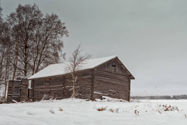 деревянные ящики на старом сарае - winter finland agriculture barn стоковые фото и изображения