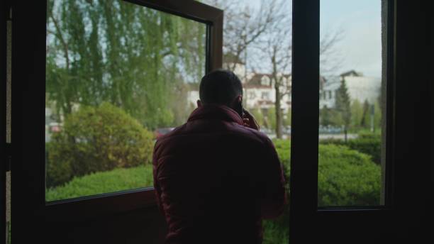 istock Man Leaves the House with Phone and Come Back 886646810