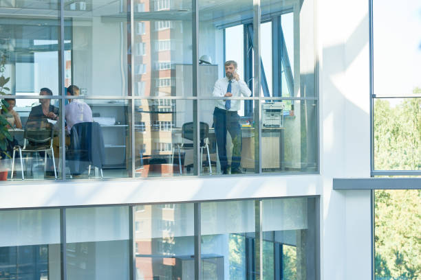 istock Business People in Modern Office Building 886650824
