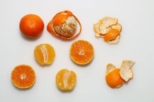 istock Mandarins in different shapes on a white background 886650966