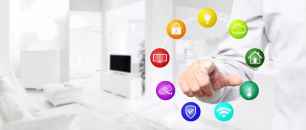 istock smart home automation hand touch screen with colored symbols on interior room background web banner and copy space template 886653704