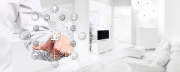 istock smart home automation hand touch screen with symbols on interior room background web banner and copy space template 886653712