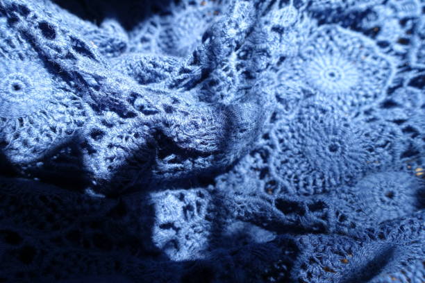 istock Crumpled pale blue old fashioned lacy fabric 886657030
