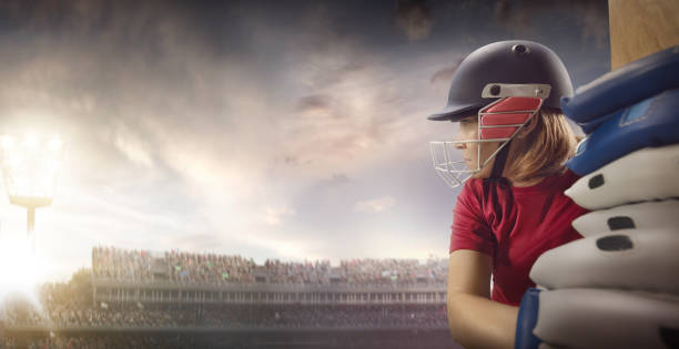 istock Cricket female batsman on a professional arena 886657204