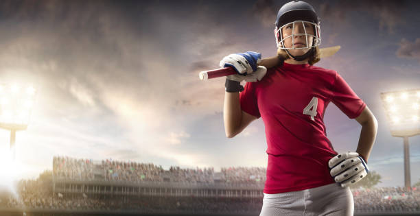 istock Cricket female batsman on a professional arena 886657234