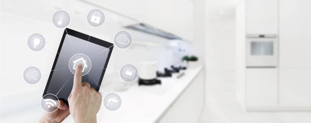 istock smart home automation hand touch digital tablet screen with symbols on kitchen background web banner and copy space template 886658200