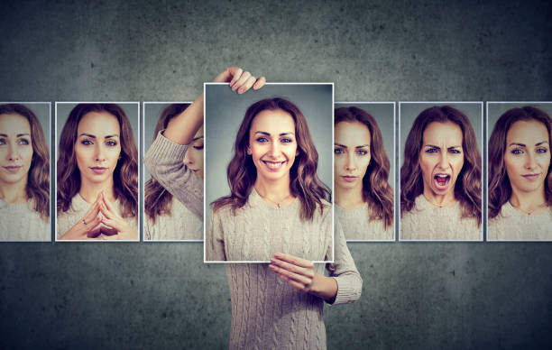 Masked woman expressing different emotions Masked woman expressing different emotions schizophrenia photos stock pictures, royalty-free photos & images