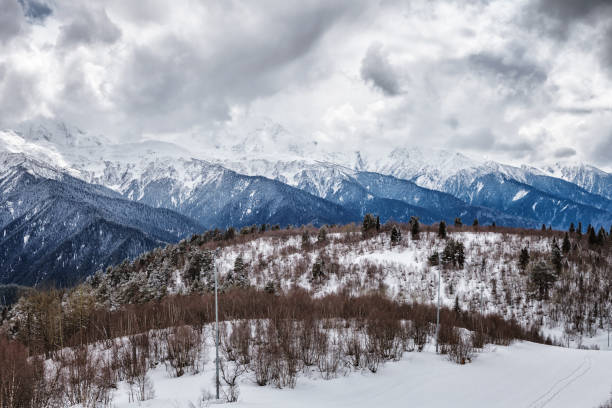 istock Panoramic view on snow winter mountains and cloud sky. Caucasus Mountains. Svaneti region of Georgia. 886675896