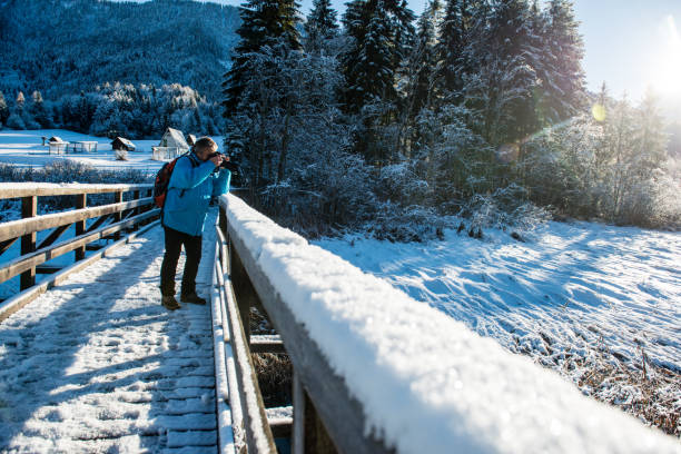 istock Senior Mountaineer in Alps, Winter 886675984