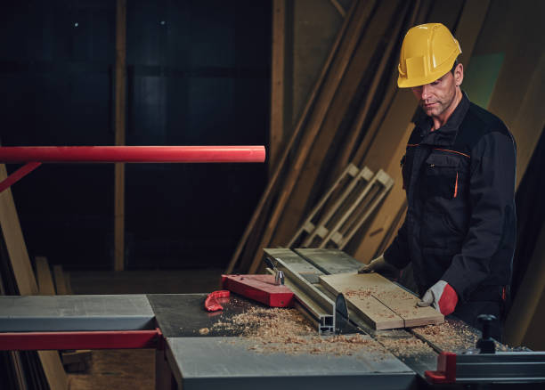 istock Carpenter male in a work place. 886676184