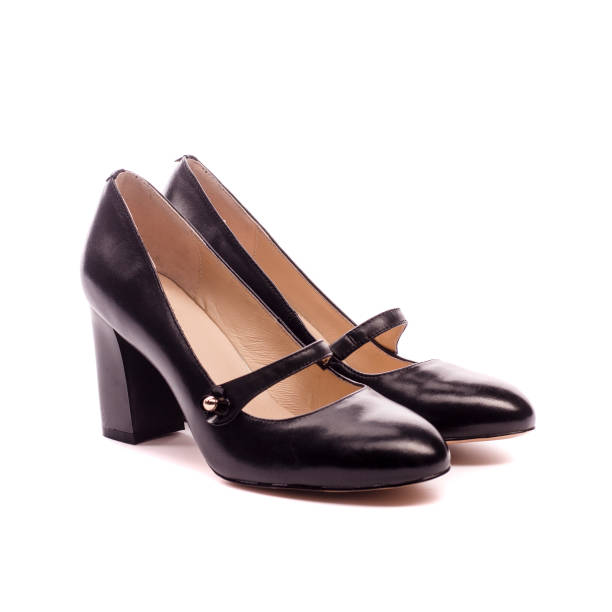 istock black women's shoes isolated on white background 886676224