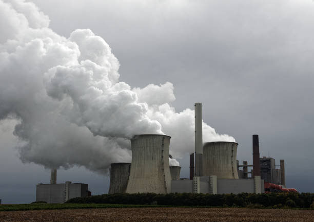 istock Lignite-fired power plants for power generation, emissions and dramatic clouds 886677474
