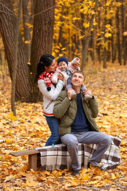 istock parents play with little daughter 886685974