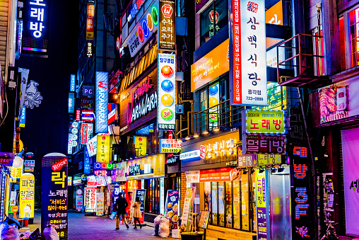 Roads with bright neon signs of the Asian city of South Korea Seoul