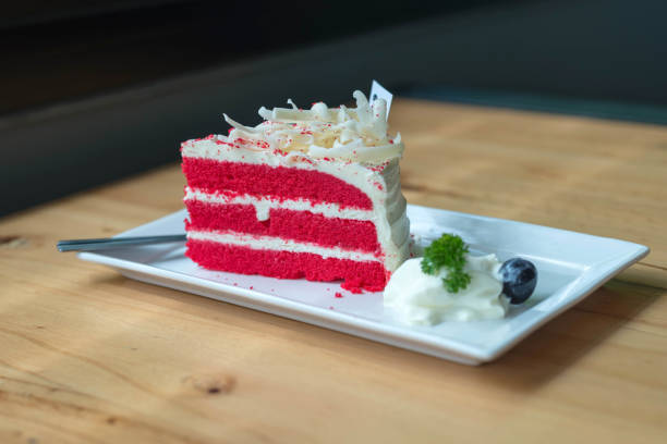 istock Red velvet cake on white plate. 886693426