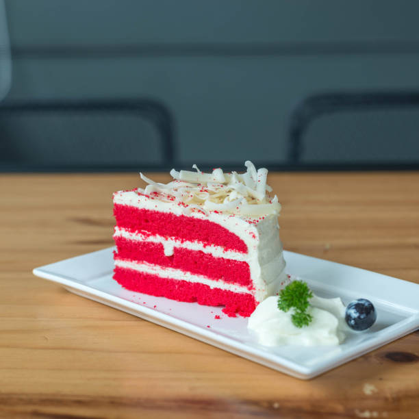 istock red velvet cake on white plate. 886693572