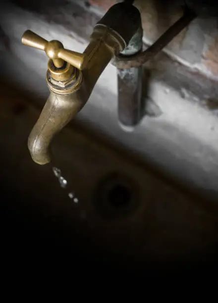 Photo of Old vintage brass water faucet