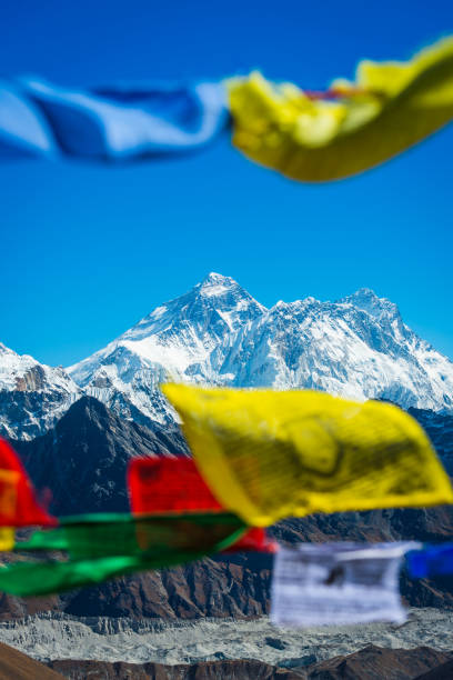 istock Mt Everest summit framed between Buddhist prayer flags Himalayas Nepal 886696778