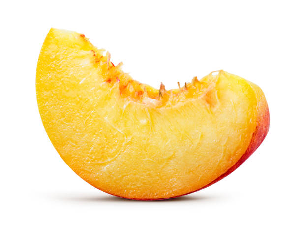 istock Peach slice isolated. Peach on white background. Macro. With clipping path. 886697160