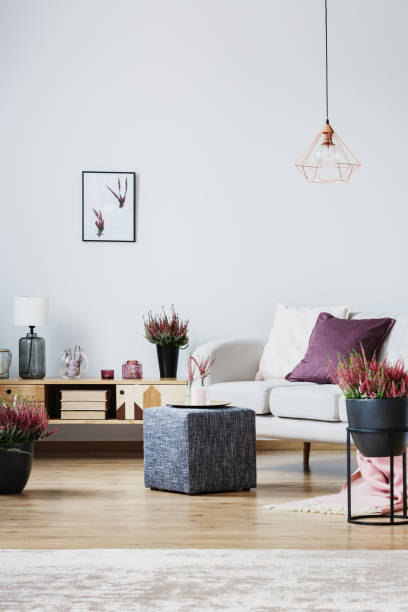 istock Living room with grey pouf 886697622