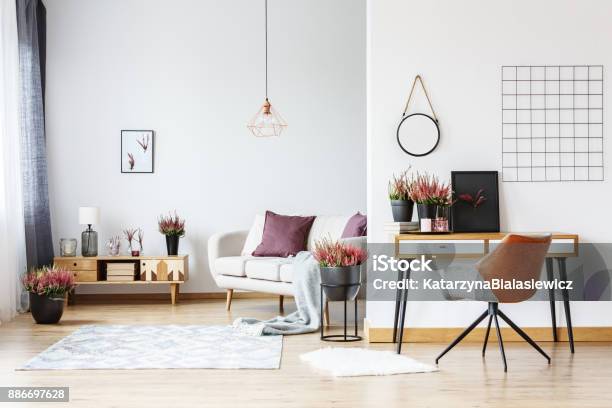 Workspace In Bright Living Room Stock Photo - Download Image Now - Living Room, Desk, Purple