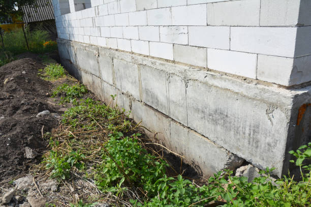 istock House foundation without any waterproofing, dampproofing and insulation. 886701332