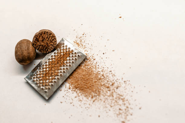 istock Kitchen still life photo close-up muscat nut powder 886706778