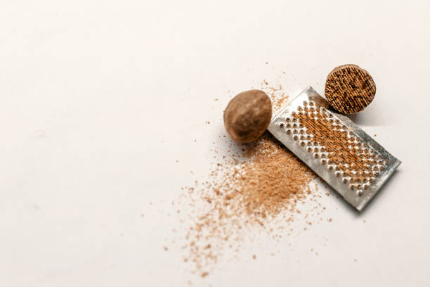 istock Kitchen still life photo close-up muscat nut powder 886706862