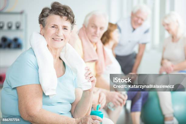 Happy Senior Woman With Towel Stock Photo - Download Image Now - Senior Adult, Exercising, Gymnastics