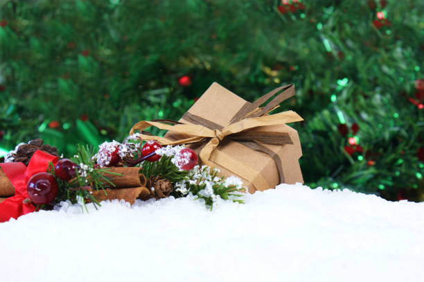 istock Christmas gift and decorations nestled in snow 886708082