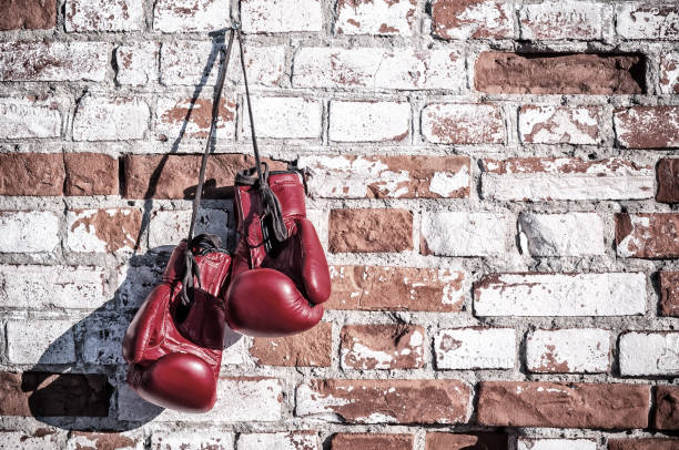 istock vintage image of boxing gloves 886712518